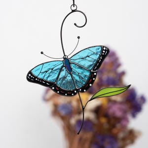 blue butterfly decor made of glass