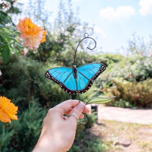 blue butterfly ornament made of stained glass