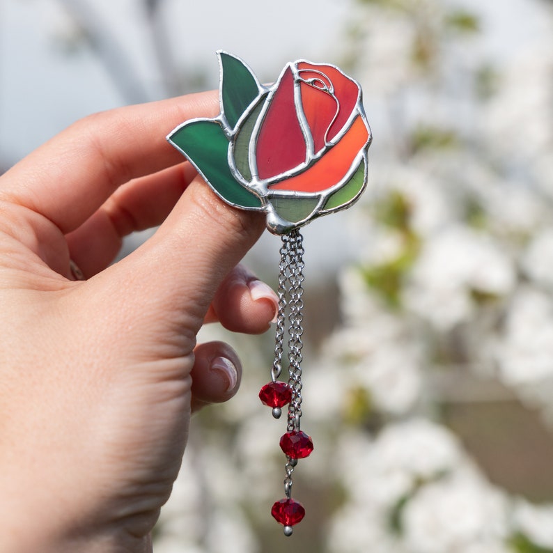 red rose pin made of stained glass