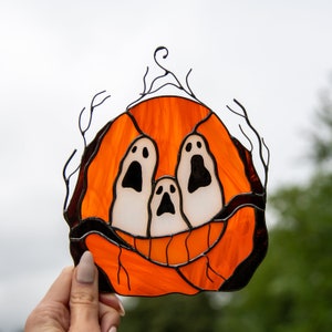 horrible pumpkin ornament made of stained glass