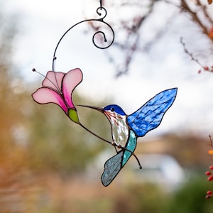 hummingbird with the pink flower window decor