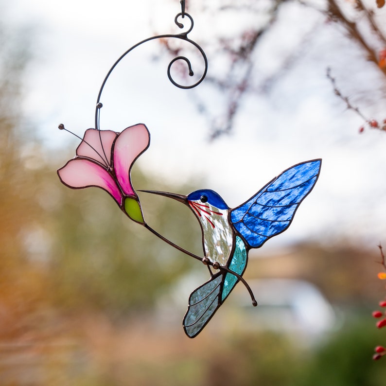 hummingbird with the pink flower window decor