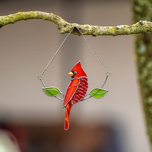 red cardinal bird made of stained glass