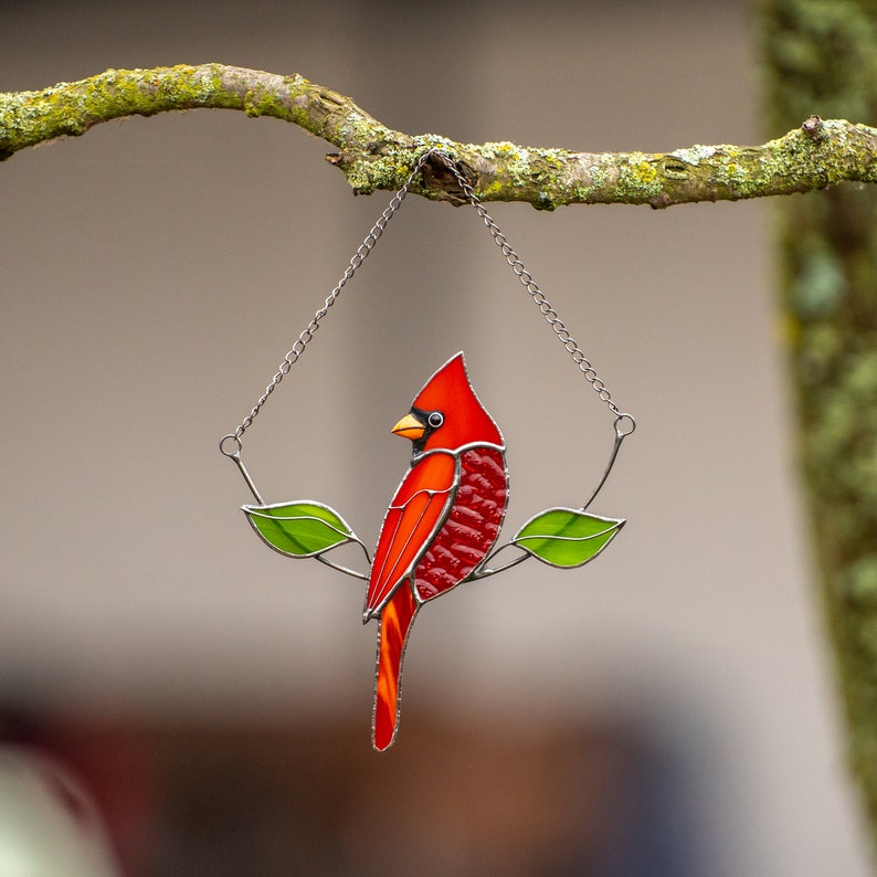 red cardinal bird made of stained glass