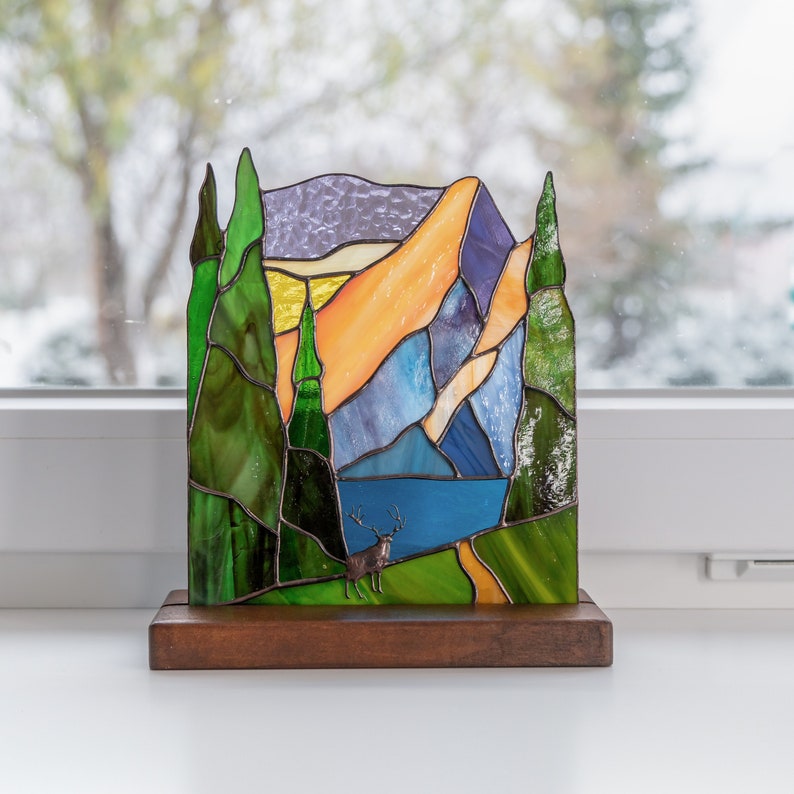 modern stained glass deer panel on the wooden base