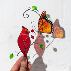 cardinal and butterfly ornament made of modern stained glass
