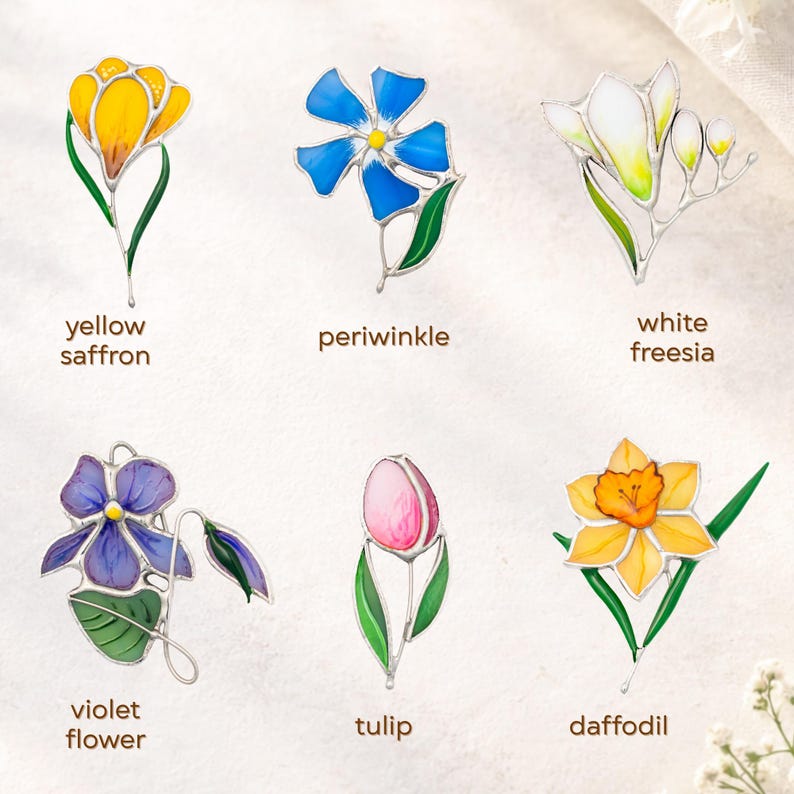 Stained glass flower brooch collection showing different designs, handmade botanical jewelry pins assortment, floral gift options.