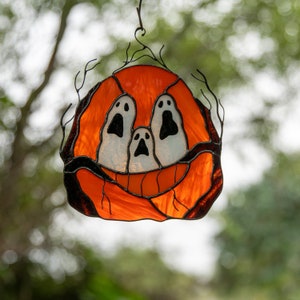 orange pumpkin artwork made of stained glass