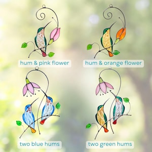 the collage of hummingbirds made of stained glass
