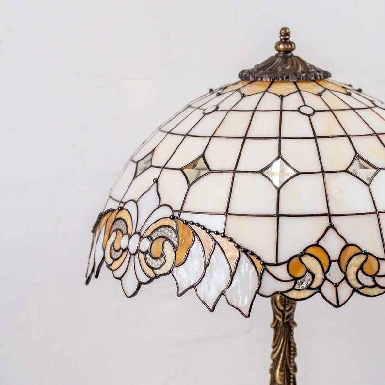 a white tiffany stained glass lamp