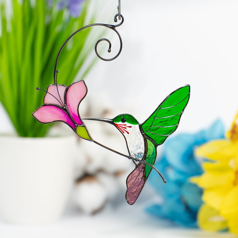 hummingbird with the pink flower made of modern stained glass