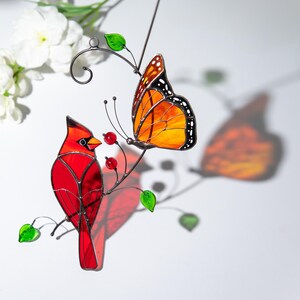 stained glass bird and butterfly light catcher