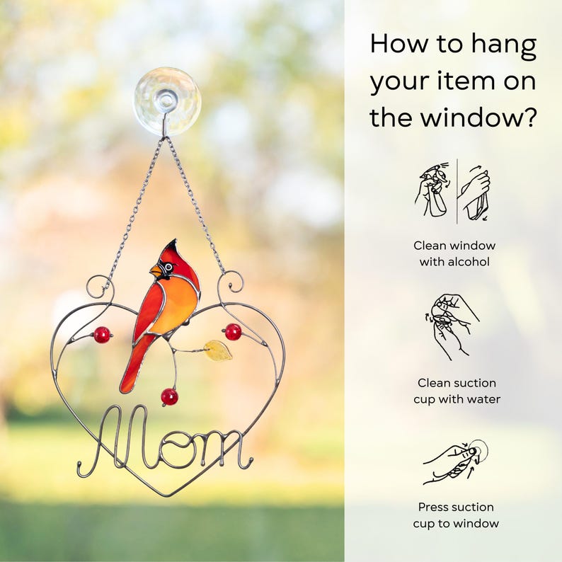 Stained glass cardinal suncatcher product infographic showing how to hang an item on a window correctly.