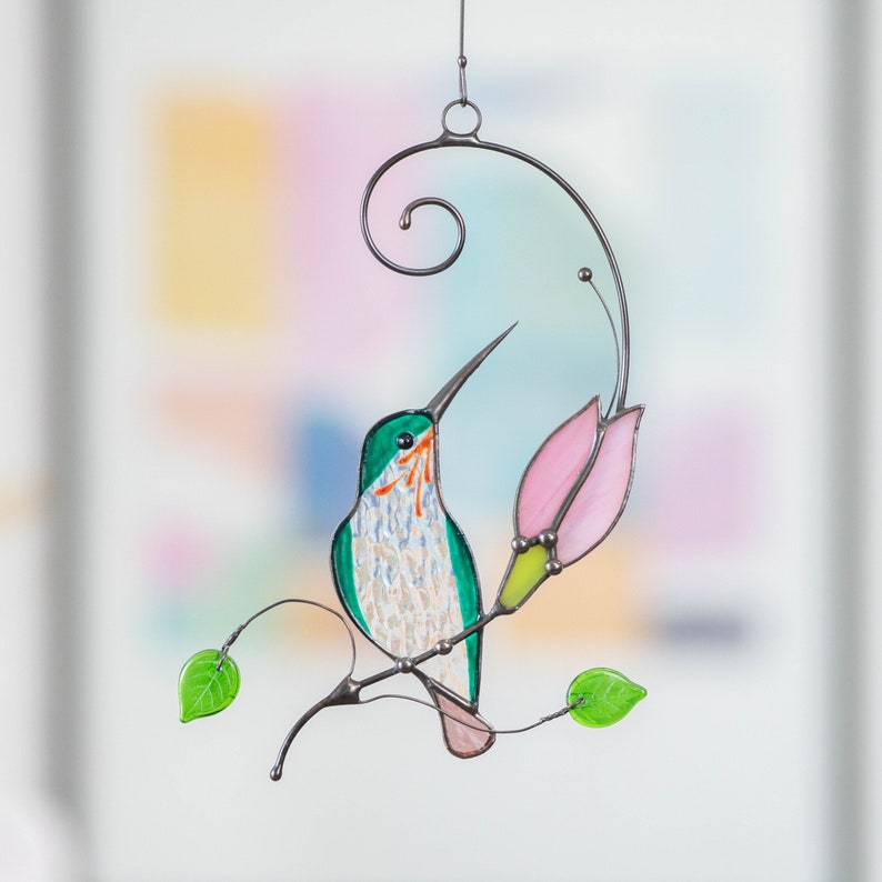 stained glass bird with pink flower suncatcher