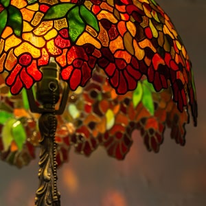 flowers on the lampshade made of stained glass