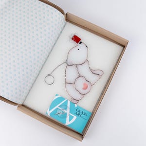 polar bear stained glass decor in the brand box of GlassArtStories