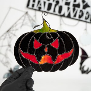 glass pumpkin decor for Halloween party