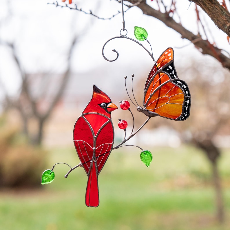handcrafted glass red cardinal and monarch butterfly window hanging