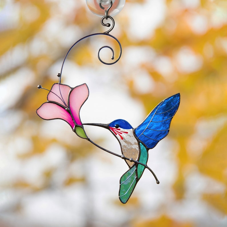 blue hummingbird light catcher created of modern stained glass