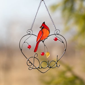 stained glass window hanging of the cardinal bird