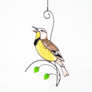 Western meadowlark stained glass suncatcher hanging on the wire