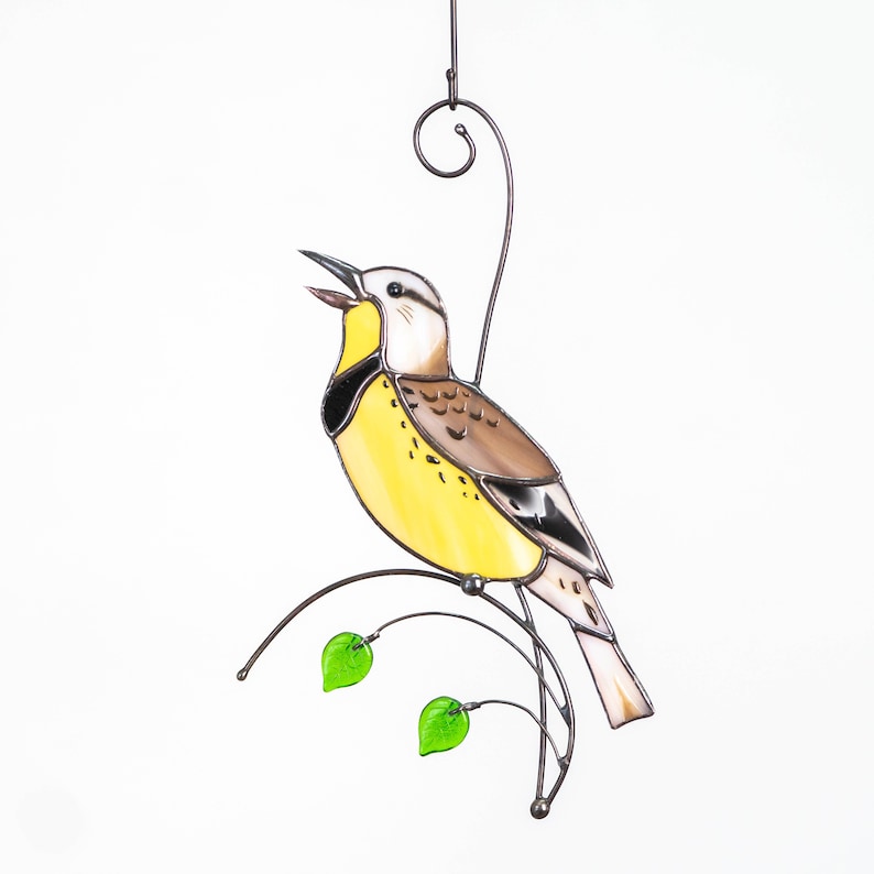 Western meadowlark stained glass suncatcher hanging on the wire