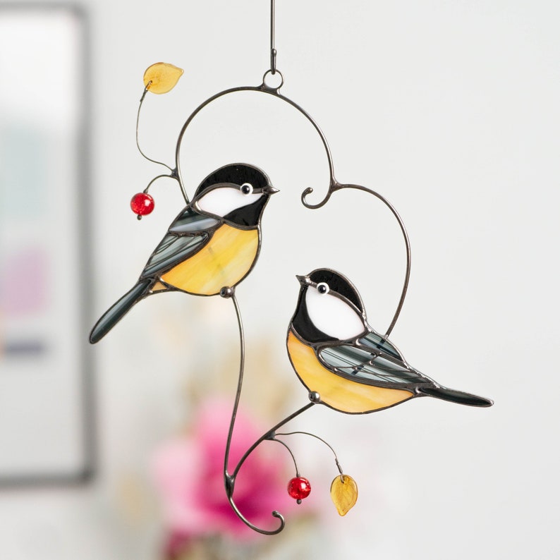 stained glass chickadees in heart shape