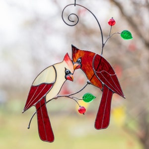 handmade glass light catcher of cardinals