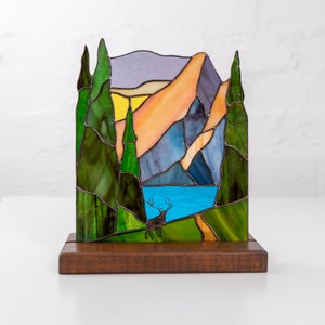 mountain stained glass panel on the wooden base