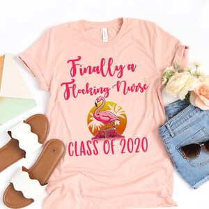 Nursing School Graduation Gift T-Shirt. 2020 RN Grad. Funny Flamingo Finally a Flocking Nurse Shirt