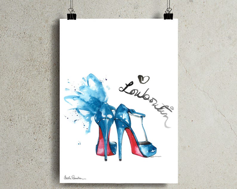 May include: Watercolor painting of two blue high-heeled shoes with red soles. The word "Louboutin" is written in cursive with a heart above it. A blue watercolor splash is behind the shoes.