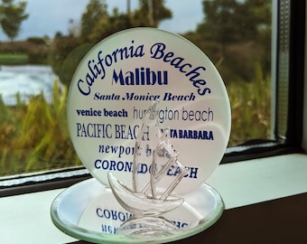 Glass Sailboat Figurine of California Beaches with a mirrored base