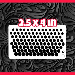 May include: White stencil with a grid of 63 black circles, measuring 2.5 x 4 inches. The stencil has a small arrow pointing down in the bottom right corner.