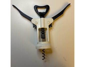 Vintage Black & White Kunststoff geflügelte Korkenzieher Engel Arme Wein Öffner USA
