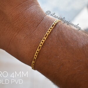 mens gold bracelets on wrist