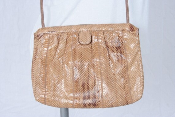 tan snakeskin bag