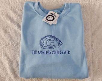 The World Is Your Oyster Embroidered Crewneck Sweatshirt