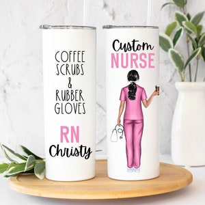 May include: White stainless steel tumbler with a pink and black design. The tumbler features the text "Coffee Scrubs & Rubber Gloves RN Christy" on one side and "Custom Nurse" with an illustration of a nurse on the other side.