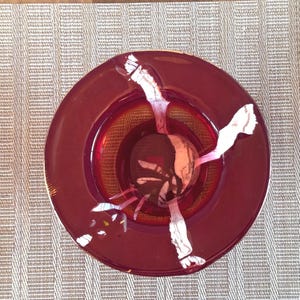 Red and white glass bowl with hand painted 24 kt gold rim