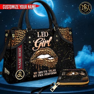 May include: Black handbag and matching wallet featuring a leopard print design and the text "LEO Girl." The handbag has a handle and a shoulder strap. The wallet has a zipper closure. The design includes a zodiac symbol and the phrase "MY MOUTH TALKS MY FACE PERFORMS."