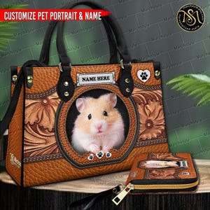 May include: A brown leather handbag and matching wallet featuring a hamster portrait. The bag has a decorative floral pattern, a circular hamster image, and the text "CUSTOMIZE PET PORTRAIT & NAME". The wallet has a zipper and a wrist strap.