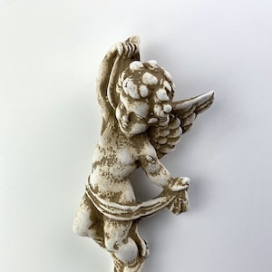Small Flying Cherub Looking Right