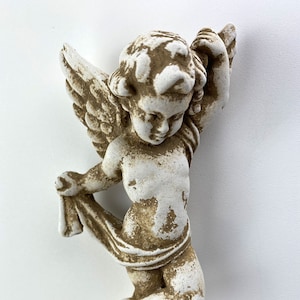 Small Flying Cherub Looking Left