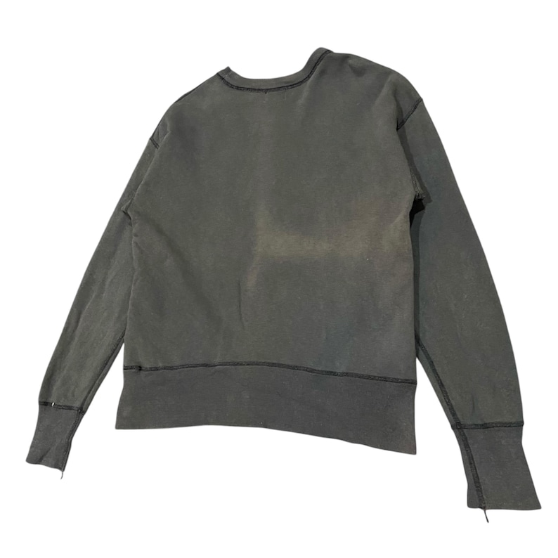 May include: A dark gray sweatshirt with long sleeves. The crew neck and cuffs have a raw edge design. The garment has a faded appearance, suggesting a vintage or worn aesthetic. The stitching is visible along the seams.