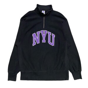 May include: Black quarter-zip sweatshirt with a purple NYU logo on the front.