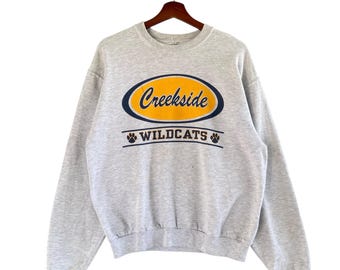 Sudadera vintage de cuello redondo de los Creekside Wildcats, talla M