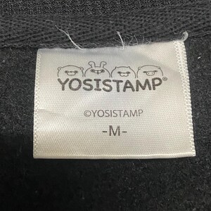 May include: White tag with black text that reads "YOSISTAMP" with three cartoon animal faces above the text. Below the text is "OYOSISTAMP" and "M".
