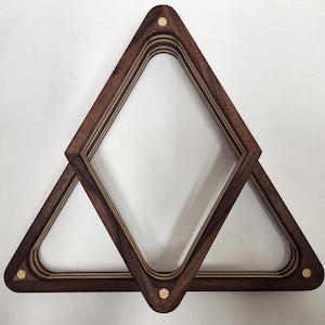 May include: A wooden triangle billiard rack with multiple layers of wood veneer. The rack is made of dark brown wood with light brown wood accents. The rack has a diamond shape and is designed to hold billiard balls.