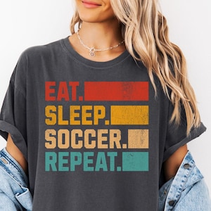 Eat Sleep Soccer Repeat T-Shirt: Unisex Soccer Fan Tee