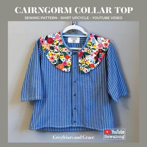 May include: Blue and white striped shirt with a floral collar. The collar features a colorful pattern of flowers and leaves. The shirt has short sleeves and a button-down front. Text on the image reads "CAIRNGORM COLLAR TOP" and "SEWING PATTERN - SHIRT UPCYCLE - YOUTUBE VIDEO."